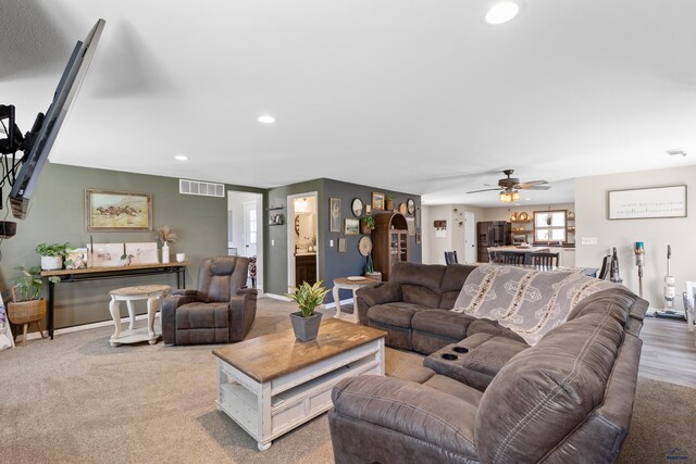 202 S B Ave, New Underwood, SD 57761 - living room with recessed lighting, ceiling fan, and baseboards