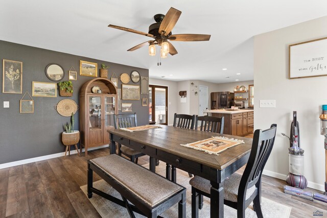 202 S B Ave, New Underwood, SD 57761 - dining room with wood finished floors, ceiling fan, baseboards, and recessed lighting