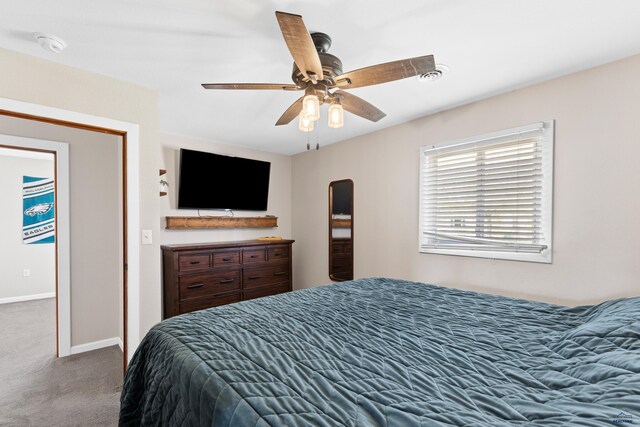 202 S B Ave, New Underwood, SD 57761 - carpeted bedroom with baseboards and ceiling fan