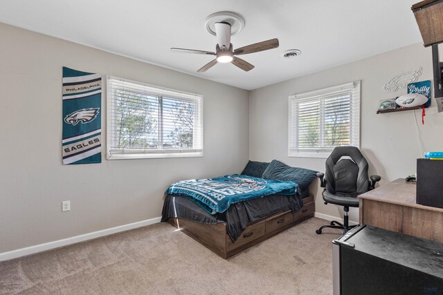 202 S B Ave, New Underwood, SD 57761 - bedroom with baseboards, carpet, a ceiling fan, and an office area