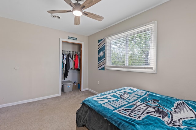 202 S B Ave, New Underwood, SD 57761 - bedroom with carpet, baseboards, a ceiling fan, and a closet