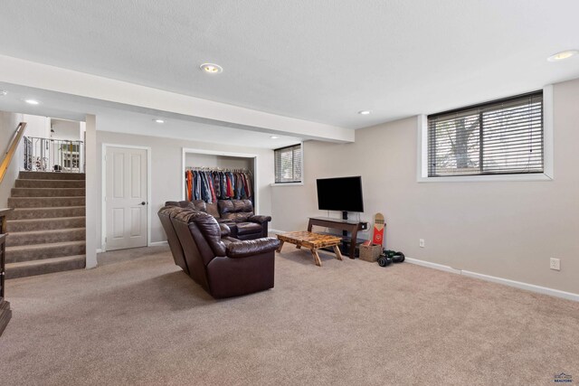 202 S B Ave, New Underwood, SD 57761 - carpeted living room featuring stairway, recessed lighting, and baseboards