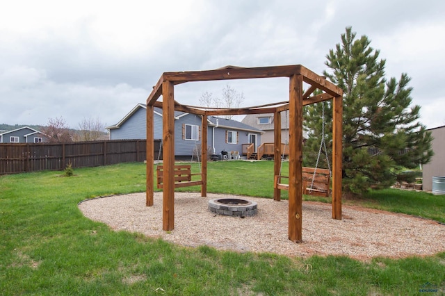 10284 Remmington St, Summerset, SD 57718 - view of play area with an outdoor fire pit and a wooden deck