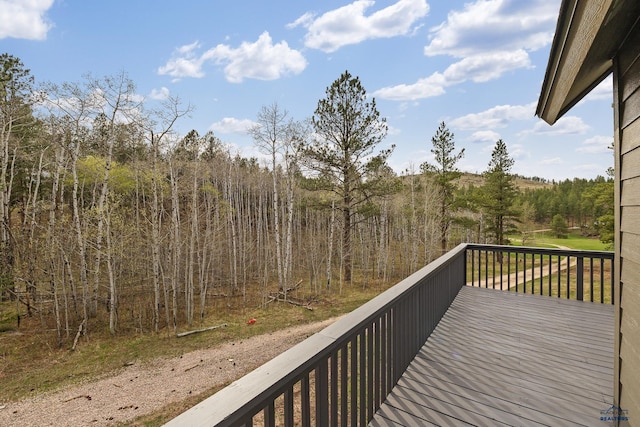 12087 Kaubisch Ranch Rd, Hill City, SD 57745 - wooden terrace with a view of trees