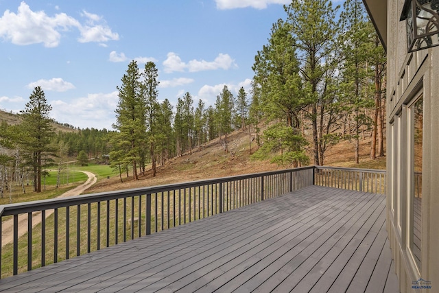 12087 Kaubisch Ranch Rd, Hill City, SD 57745 - wooden terrace with a yard