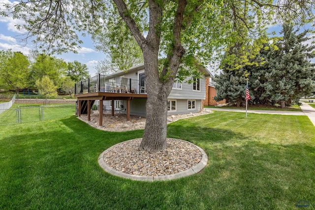 3204 Flint Dr, Rapid City, SD 57702 - view of yard with a wooden deck and a gate