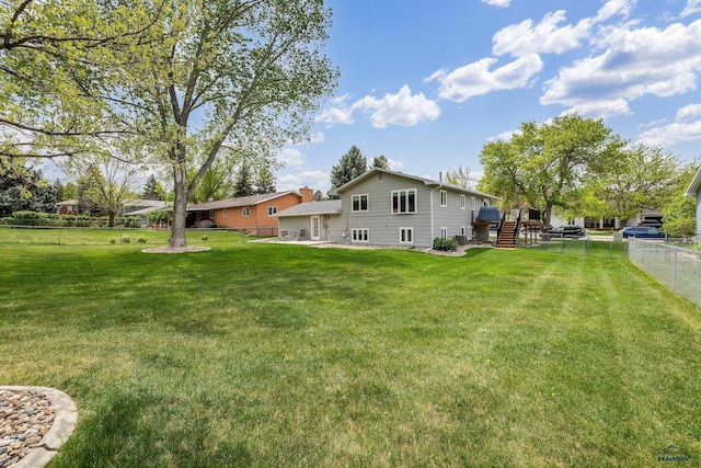3204 Flint Dr, Rapid City, SD 57702 - rear view of house with stairway and a deck