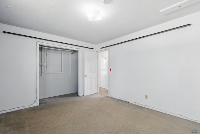 5753 Pluto, Rapid City, SD 57703 - unfurnished bedroom featuring carpet floors and a closet