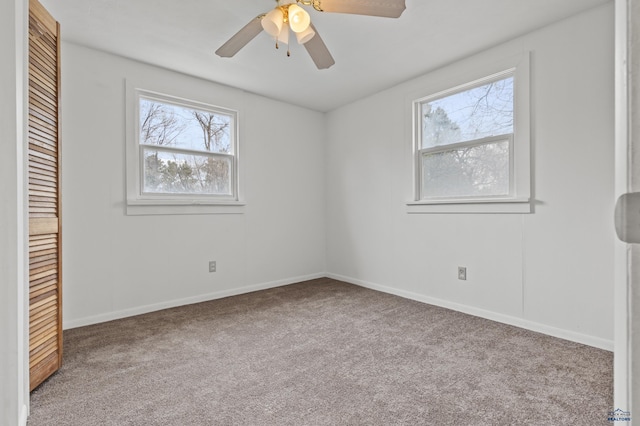 4648 Carol, Rapid City, SD 57703 - unfurnished bedroom featuring carpet, a closet, baseboards, and a ceiling fan