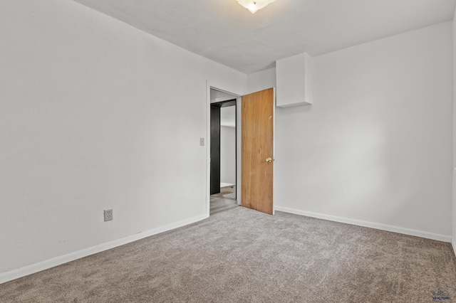 4648 Carol, Rapid City, SD 57703 - carpeted spare room featuring baseboards