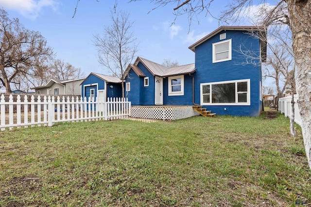 4648 Carol, Rapid City, SD 57703 - view of front of property with stucco siding, metal roof, an outdoor structure, a standing seam roof, and entry steps