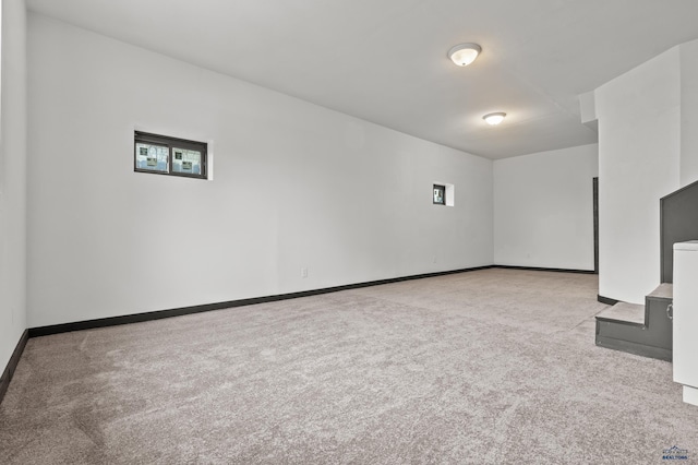 4648 Carol, Rapid City, SD 57703 - unfurnished living room with carpet floors and baseboards