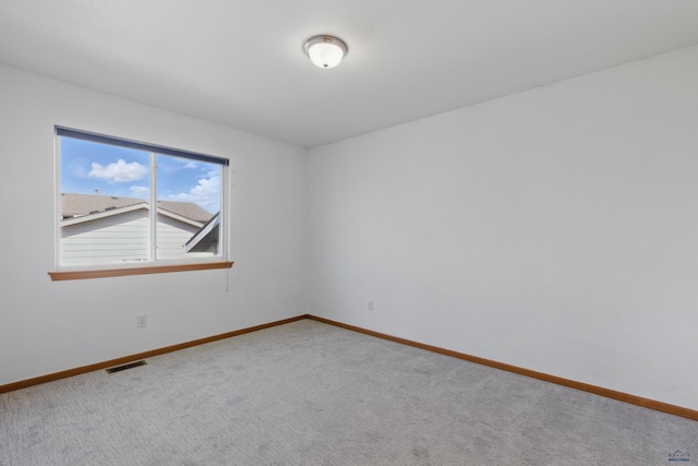 573 Plover Dr, Box Elder, SD 57719 - empty room featuring carpet and baseboards