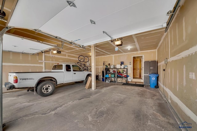 2930 Princeton Ct, Rapid City, SD 57702 - garage featuring a garage door opener