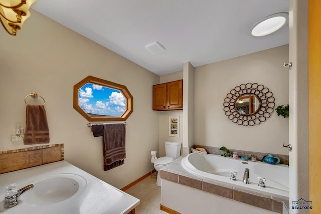 2930 Princeton Ct, Rapid City, SD 57702 - bathroom featuring toilet, a bath, baseboards, and vanity