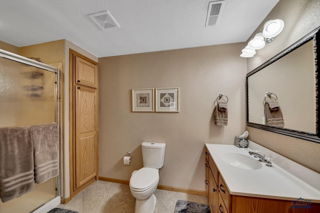 2930 Princeton Ct, Rapid City, SD 57702 - full bath with vanity, a stall shower, tile patterned floors, toilet, and baseboards