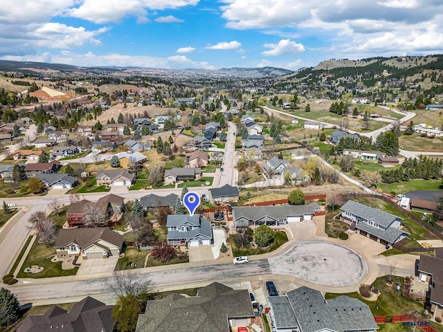 2930 Princeton Ct, Rapid City, SD 57702 - aerial view of property's location featuring nearby suburban area and a mountainous background