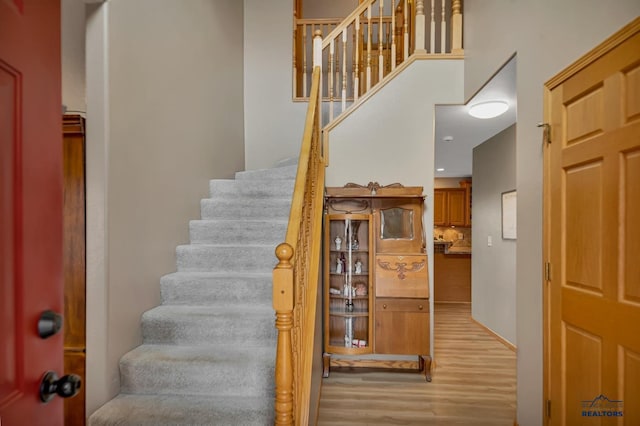 2930 Princeton Ct, Rapid City, SD 57702 - stairway featuring wood finished floors