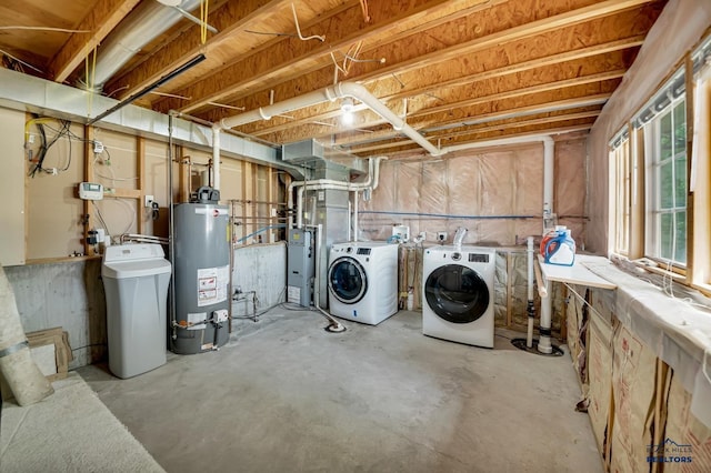 4307 Henry Ct, Rapid City, SD 57701 - below grade area featuring a water softener, water heater, washing machine and clothes dryer, and heating unit