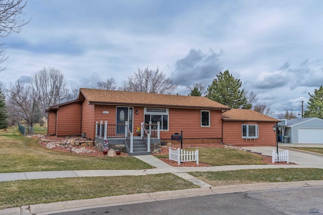 2030 12th Ave, Belle Fourche, SD 57717 - ranch-style home with a front yard, driveway, and roof with shingles