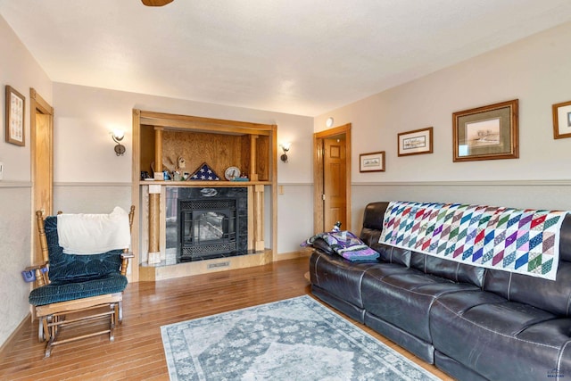 2030 12th Ave, Belle Fourche, SD 57717 - living area featuring wood finished floors and a premium fireplace