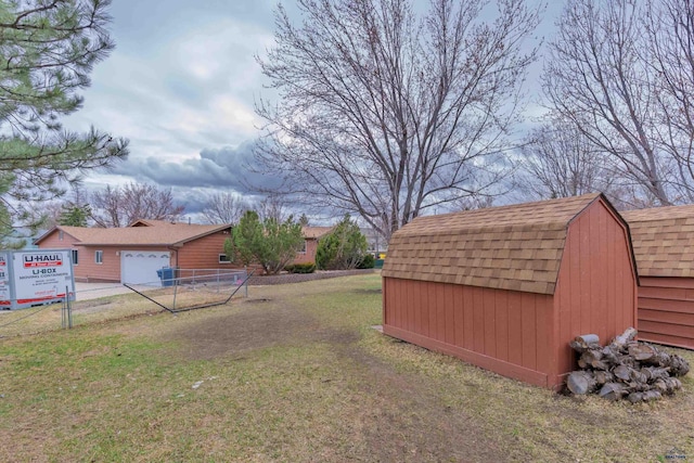 2030 12th Ave, Belle Fourche, SD 57717 - view of yard featuring a storage shed, an outbuilding, and a garage