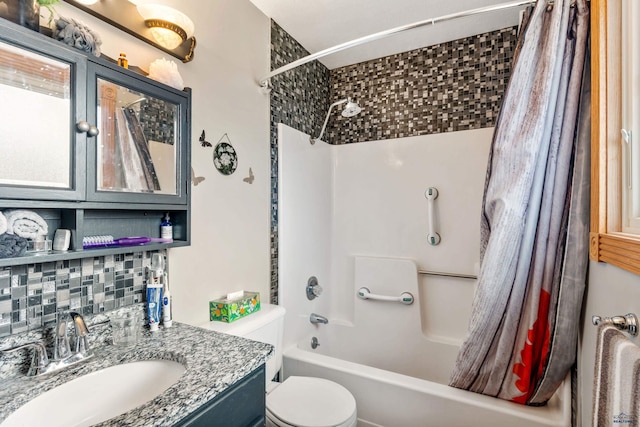 2030 12th Ave, Belle Fourche, SD 57717 - full bathroom featuring decorative backsplash, shower / bath combo, vanity, and toilet