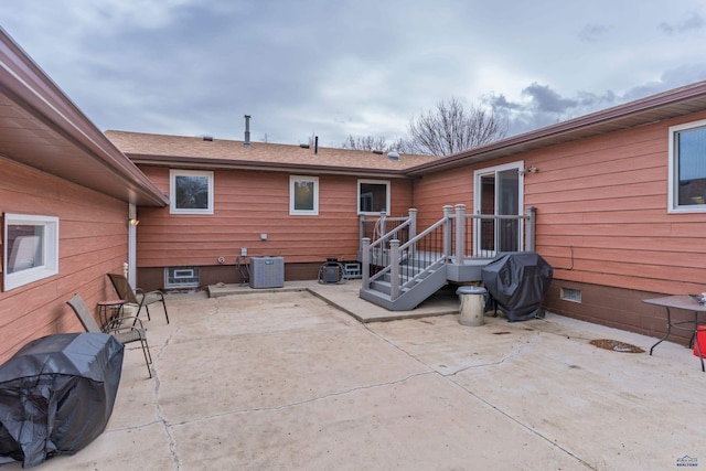 2030 12th Ave, Belle Fourche, SD 57717 - rear view of property with central air condition unit and a patio area
