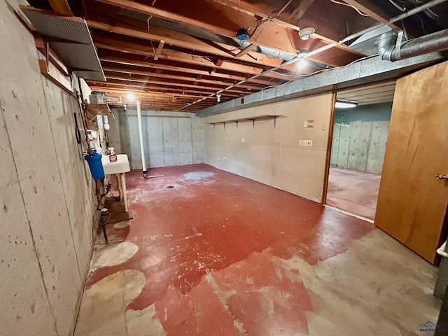 1504 Morningside Dr, Rapid City, SD 57701 - unfinished basement with a sink