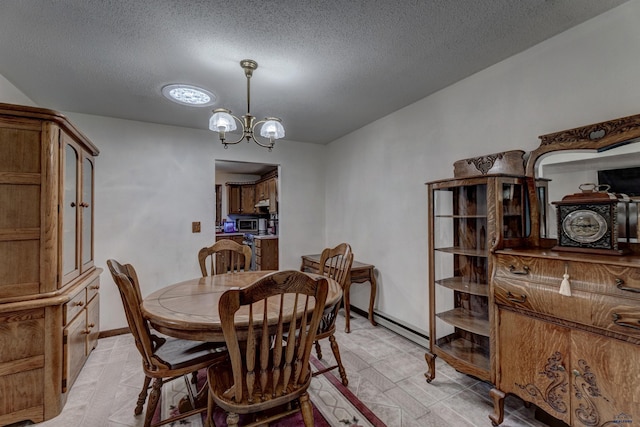 4240 Foothill Dr, Rapid City, SD 57702 - dining room featuring a textured ceiling and a chandelier