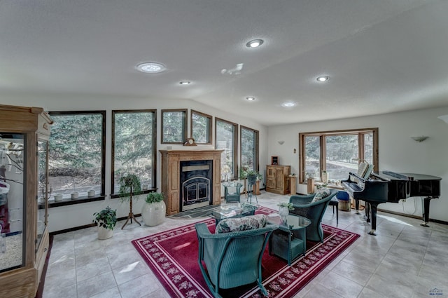 4240 Foothill Dr, Rapid City, SD 57702 - tiled living room with lofted ceiling, a fireplace, baseboards, and recessed lighting