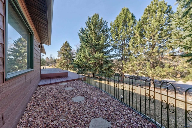 4240 Foothill Dr, Rapid City, SD 57702 - view of yard featuring fence and a deck