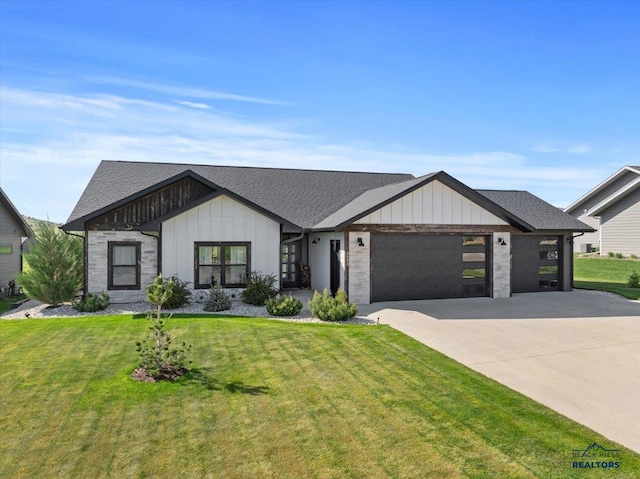 8009 Brooks Loop, Spearfish, SD 57783 - modern farmhouse style home featuring an attached garage, concrete driveway, a front lawn, board and batten siding, and roof with shingles