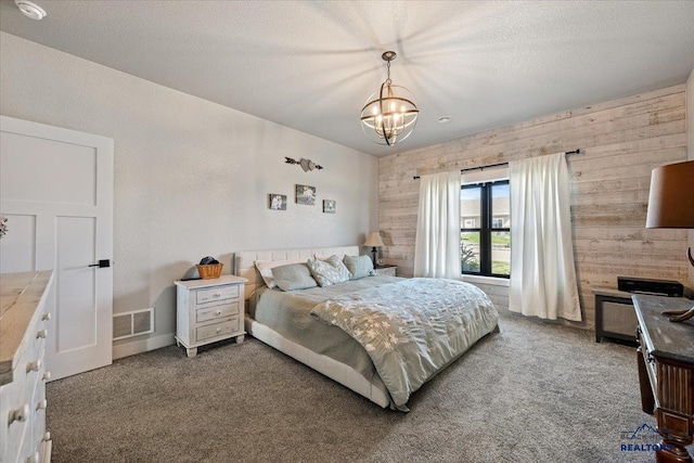 8009 Brooks Loop, Spearfish, SD 57783 - carpeted bedroom with wooden walls and a chandelier