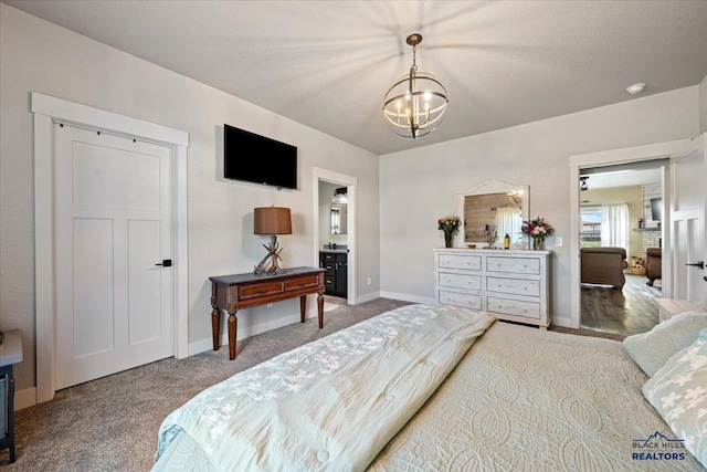 8009 Brooks Loop, Spearfish, SD 57783 - bedroom with carpet flooring, baseboards, and a chandelier