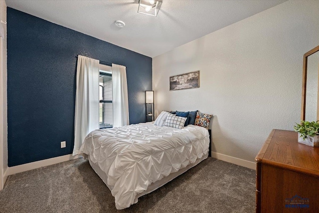 8009 Brooks Loop, Spearfish, SD 57783 - carpeted bedroom with baseboards and a textured wall