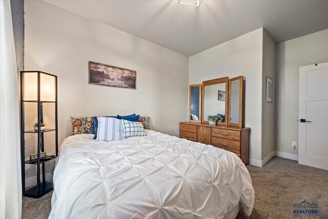 8009 Brooks Loop, Spearfish, SD 57783 - carpeted bedroom featuring baseboards