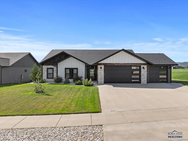 8009 Brooks Loop, Spearfish, SD 57783 - modern farmhouse style home featuring a garage, a front lawn, driveway, and board and batten siding