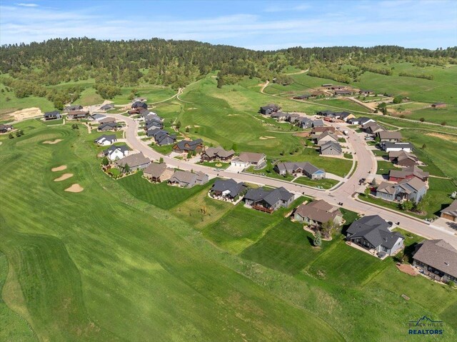 8009 Brooks Loop, Spearfish, SD 57783 - aerial overview of property's location with nearby suburban area, a forest, and a golf course