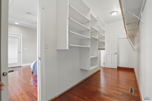 960 Nicole St, Rapid City, SD 57701 - spacious closet with dark wood-style flooring
