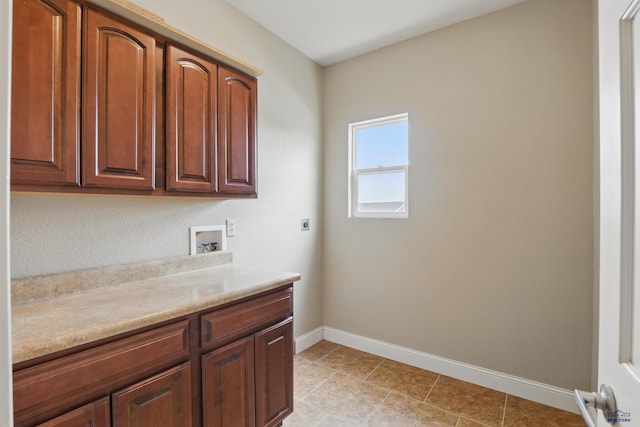 960 Nicole St, Rapid City, SD 57701 - laundry room featuring cabinet space, baseboards, electric dryer hookup, and washer hookup