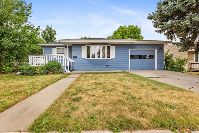 2739 W W St, Anne, Rapid City, SD 57701 - ranch-style home with a garage, concrete driveway, and a front lawn