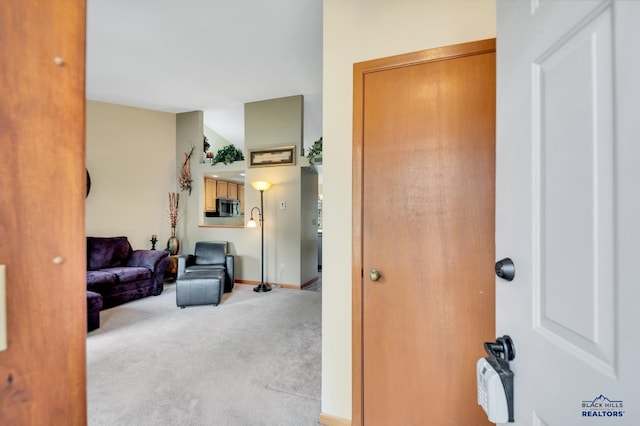 4801 Prairie Rose Pl, Rapid City, SD 57702 - foyer entrance featuring carpet and baseboards