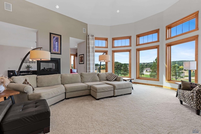 6717 Kennemer Dr, Rapid City, SD 57702 - living area featuring carpet flooring, recessed lighting, and a high ceiling