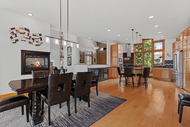 6717 Kennemer Dr, Rapid City, SD 57702 - dining space with recessed lighting and light wood-style flooring