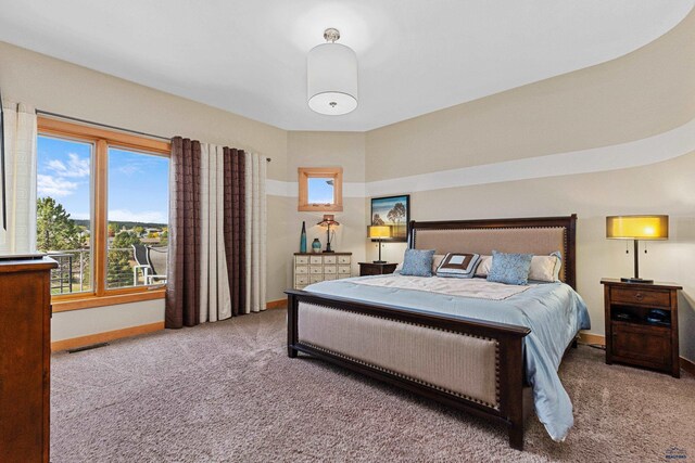 6717 Kennemer Dr, Rapid City, SD 57702 - carpeted bedroom featuring baseboards