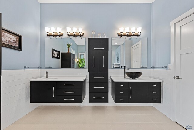 6717 Kennemer Dr, Rapid City, SD 57702 - full bath featuring two vanities and tile patterned flooring