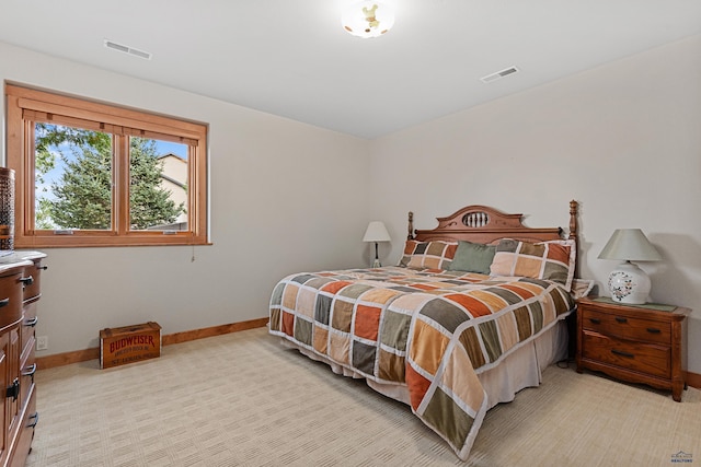 6717 Kennemer Dr, Rapid City, SD 57702 - bedroom with baseboards and light colored carpet