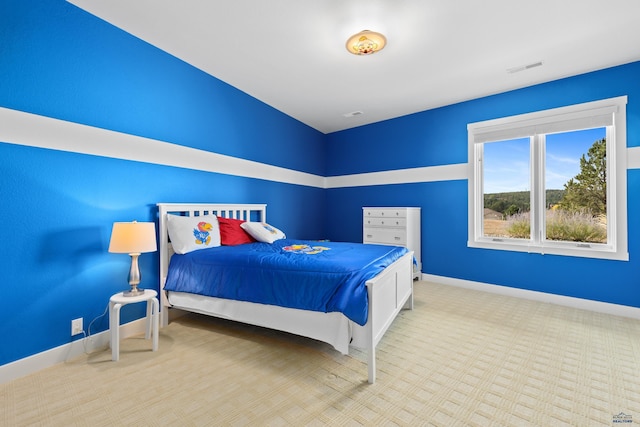 6717 Kennemer Dr, Rapid City, SD 57702 - carpeted bedroom featuring baseboards