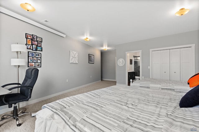 6717 Kennemer Dr, Rapid City, SD 57702 - bedroom with carpet, baseboards, and ensuite bathroom